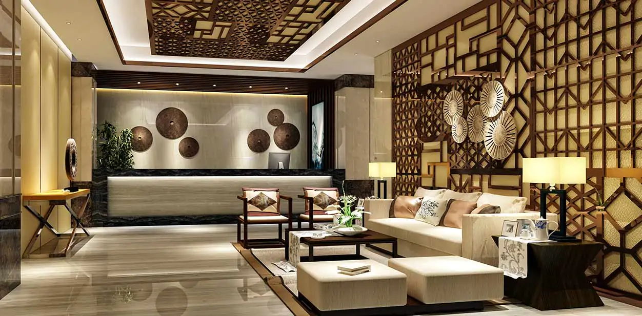 Luxurious hotel reception with ornate wood paneling, geometric decor, cream seating, and ambient lighting.